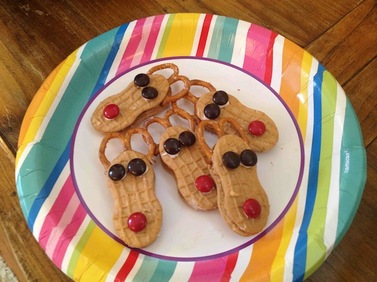 Homemade reindeer Christmas cookies with red nose
