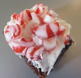 Rice Krispie treats shaped like Christmas trees with candy ornaments