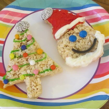 Santa Claus face cupcake with marshmallow beard and red hat